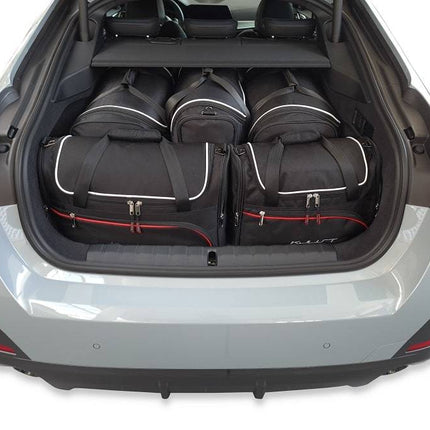 Kjust Kjust Reistassenset voor BMW 4 serie Gran coupe vanaf 2021 - Set van 5 Tassen met 2 Roltassen 1 Sporttas en 2 Vliegtuigtassen Harvest Automotive 1