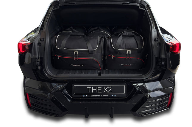 Kjust Kjust Reistassenset voor BMW iX2 vanaf 2023 - Set van 5 Tassen met 3 Roltassen en 2 Vliegtuigtassen Harvest Automotive 1