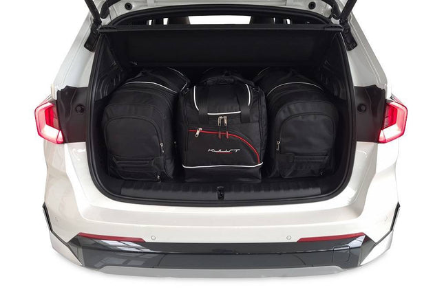 Kjust Kjust Reistassenset voor BMW X1 vanaf 2022 - Set van 4 Tassen met 2 Roltassen en 2 Sporttassen Harvest Automotive 1