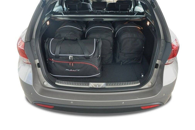 Kjust Kjust Reistassenset voor Hyundai i40 Tourer vanaf 2011 - Set van 5 Tassen met 3 Roltassen en 2 Vliegtuigtassen Harvest Automotive 2