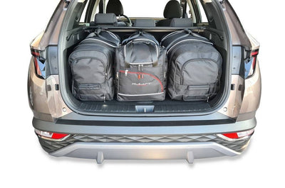 Kjust Reistassenset voor Hyundai Tucson vanaf 2020 - Set van 4 Tassen met 2 Roltassen 1 Sporttas en 1 Vliegtuigtas