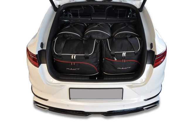 Kjust Kjust Reistassenset voor Kia ProCeed stationwagen vanaf 2019 - Set van 5 Tassen met 3 Roltassen en 2 Vliegtuigtassen Harvest Automotive 1
