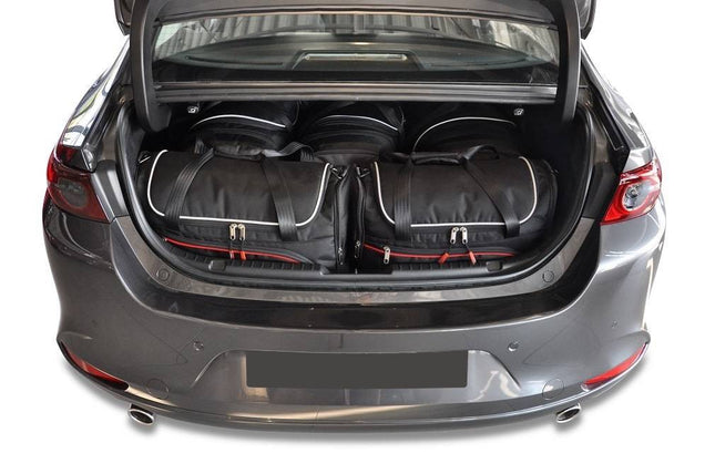 Kjust Kjust Reistassenset voor Mazda 3 Sedan vanaf 2019 - Set van 5 Tassen met 3 Roltassen en 2 Vliegtuigtassen Harvest Automotive 1