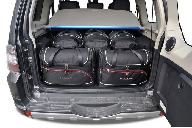 Kjust Kjust Reistassenset voor Mitsubishi Pajero 2000-2006 - Set van 5 Tassen met 3 Roltassen en 2 Vliegtuigtassen Harvest Automotive 1