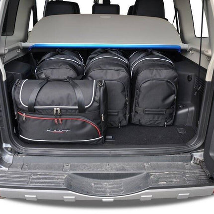 Kjust Kjust Reistassenset voor Mitsubishi Pajero 2000-2006 - Set van 5 Tassen met 3 Roltassen en 2 Vliegtuigtassen Harvest Automotive 2