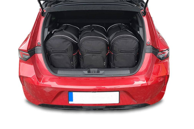 Kjust Kjust Reistassenset voor Opel Astra 5-deurs vanaf 2022 - Set van 3 Tassen met 3 Roltassen Harvest Automotive 1