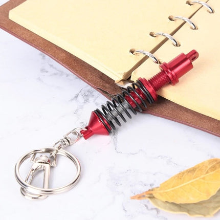 Mini Schokbreker Sleutelhanger – Aluminium met Beweegbare Vering (Rood) - VCTparts.nl