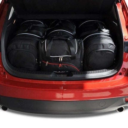Kjust Reistassenset voor Mazda 3 Fastback vanaf 2014 - Set van 4 Tassen met 2 Roltassen 1 Sporttas en 1 Vliegtuigtas