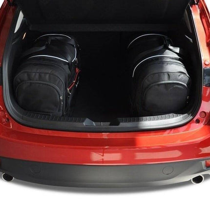 Kjust Reistassenset voor Mazda 3 Fastback vanaf 2014 - Set van 4 Tassen met 2 Roltassen 1 Sporttas en 1 Vliegtuigtas