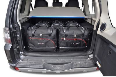 Kjust Reistassenset voor Mitsubishi Pajero 2000-2006 - Set van 5 Tassen met 3 Roltassen en 2 Sporttassen
