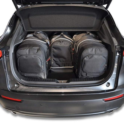 Kjust Reistassenset voor Mazda CX-30 vanaf 2019 - Set van 4 Tassen met 2 Roltassen 1 Sporttas en 1 Vliegtuigtas