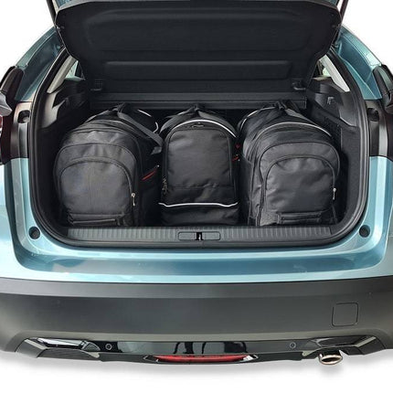 Kjust Reistassenset voor Citroen e-C4 5-deurs vanaf 2020 - Set van 4 Tassen met 2 Roltassen 1 Sporttas en 1 Vliegtuigtas