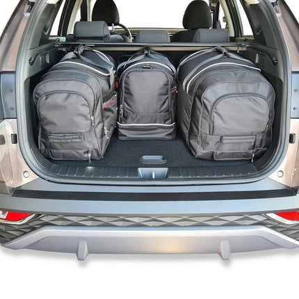 Kjust Reistassenset voor Hyundai Tucson vanaf 2020 - Set van 4 Tassen met 2 Roltassen 1 Sporttas en 1 Vliegtuigtas