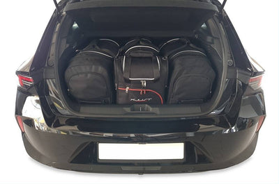 Kjust Reistassenset voor Opel Astra 5-deurs vanaf 2022 - Set van 4 Tassen met 2 Roltassen 1 Sporttas en 1 Vliegtuigtas