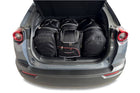 Kjust Reistassenset voor Mazda MX-30 vanaf 2022 - Set van 4 Tassen met 2 Roltassen 1 Sporttas en 1 Vliegtuigtas